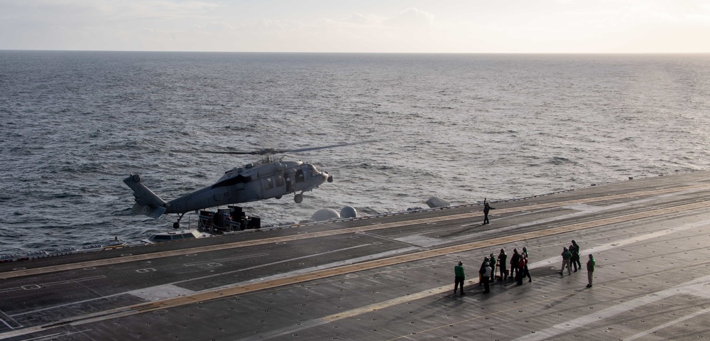 MH-60S Sea Hawk prepares to land on the flight deck