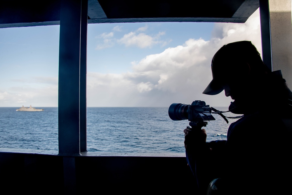 Mass Communications Specialist 3rd Class films the USS Portland