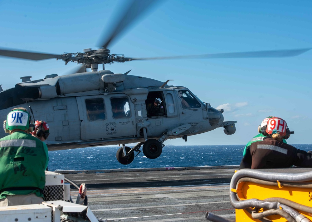 USS Ronald Reagan (CVN 76) Sailors conduct helicopter operations