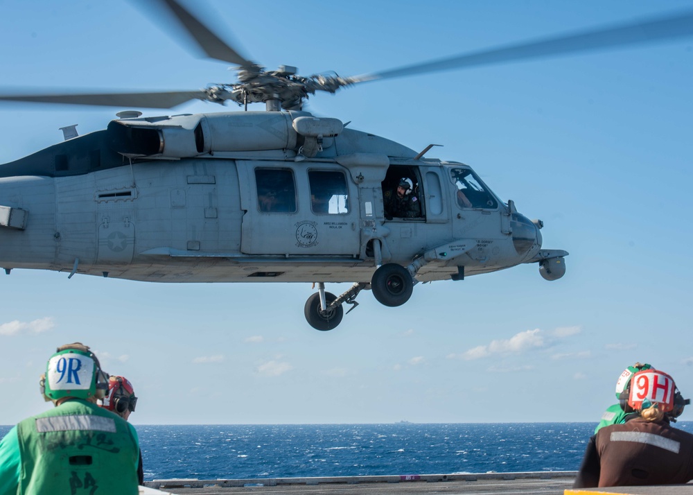 USS Ronald Reagan (CVN 76) Sailors conduct helicopter operations