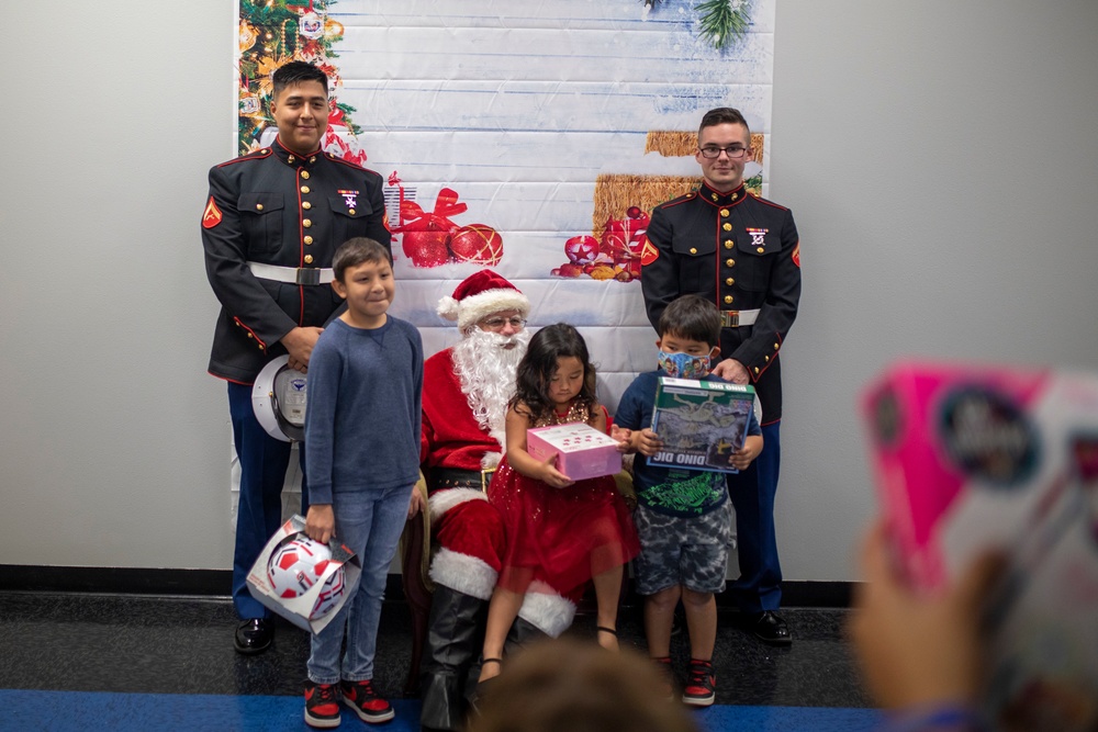 U.S. Marines volunteer at Toys for Tots event