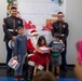 U.S. Marines volunteer at Toys for Tots event