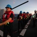 U.S. Navy Sailors handle the phone and distance line aboard USS Chung-Hoon