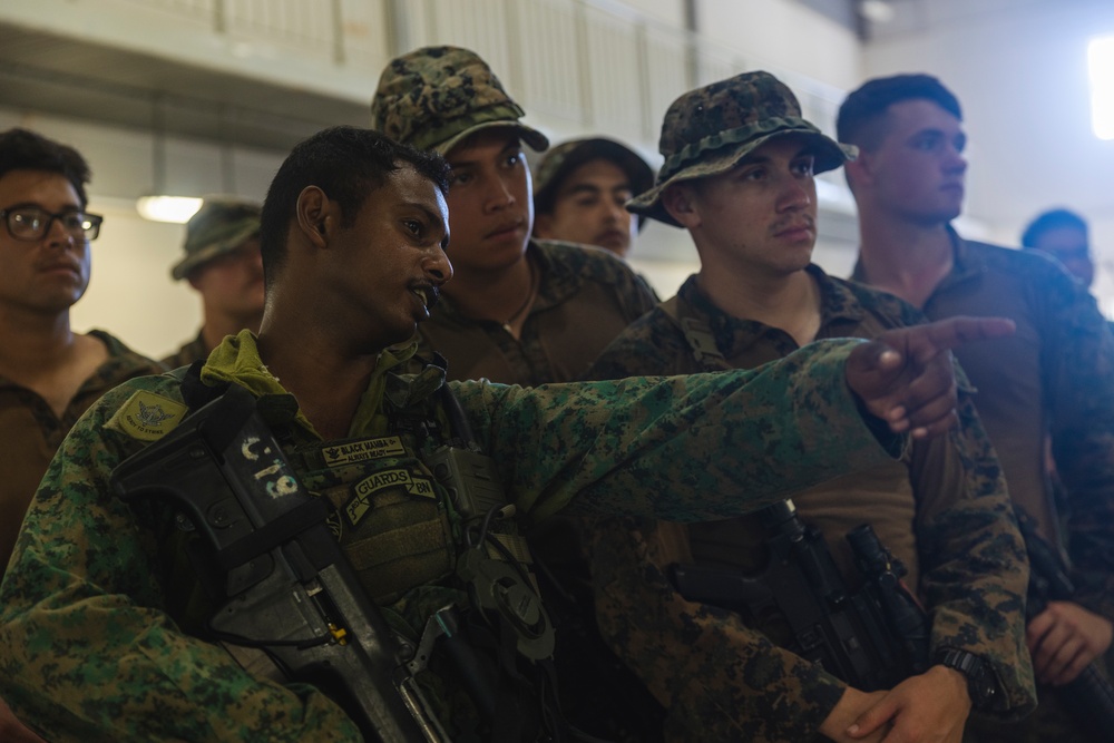 U.S. Marines and Singapore Army soldiers conduct urban operations exchange