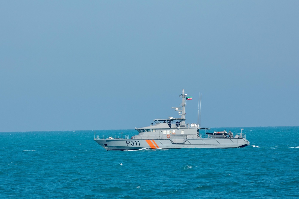 USS Dextrous Navigates with Iraq Patrol Boat in Arabian Gulf