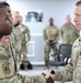 SMA Grinston gives coins to Soldiers while visiting Camp Arifjan, December, 2022