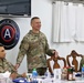 SMA Grinston gives coins to Soldiers while visiting Camp Arifjan, December, 2022