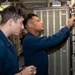 USS Ronald Reagan (CVN) 76 Sailors set up a high frequency radio circuit