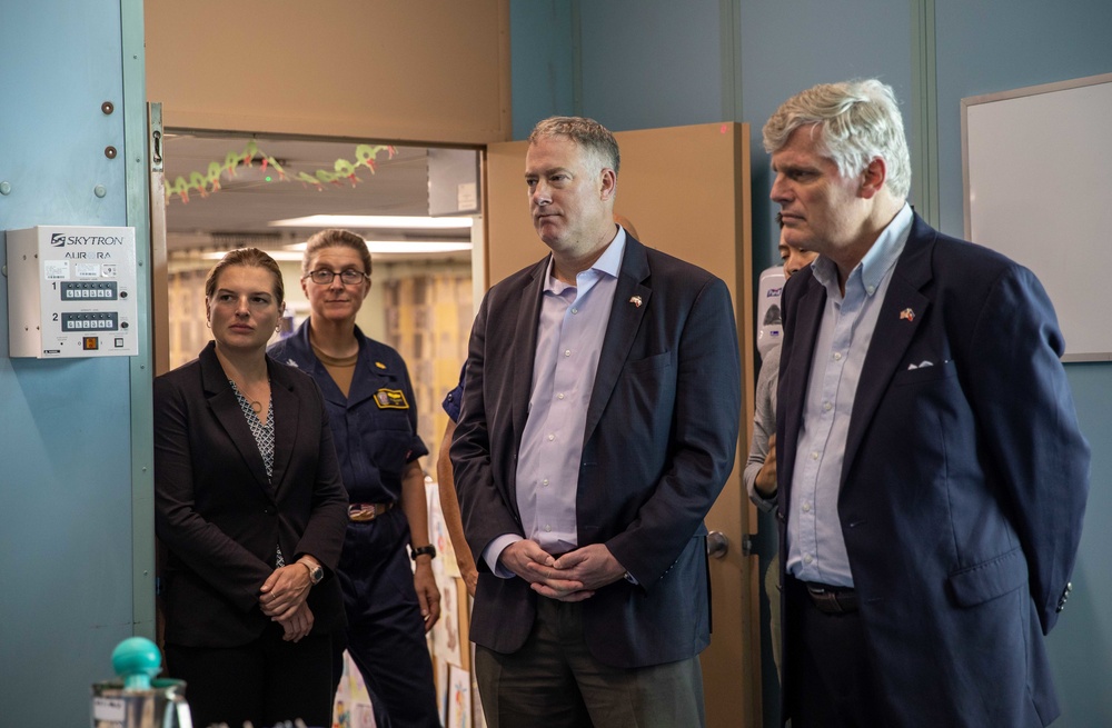 Daniel P. Erikson, deputy assistant, Secretary of Defense for the Western Hemisphere and Ambassador Eric W. Stromayer take a tour of USNS Comfort during Continuing Promise 2022, in Jeremie, Haiti