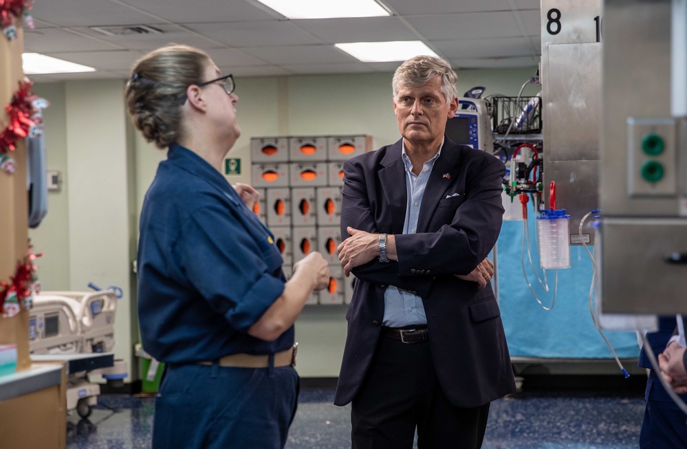 Ambassador Eric W. Stromayer takes a tour of USNS Comfort during Continuing Promise 2022, in Jeremie, Haiti