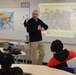 Naval Museum staff present a history presentation to students enrolled at Nansemond River High School in Suffolk, Virginia