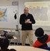 Naval Museum staff present a history presentation to students enrolled at Nansemond River High School in Suffolk, Virginia