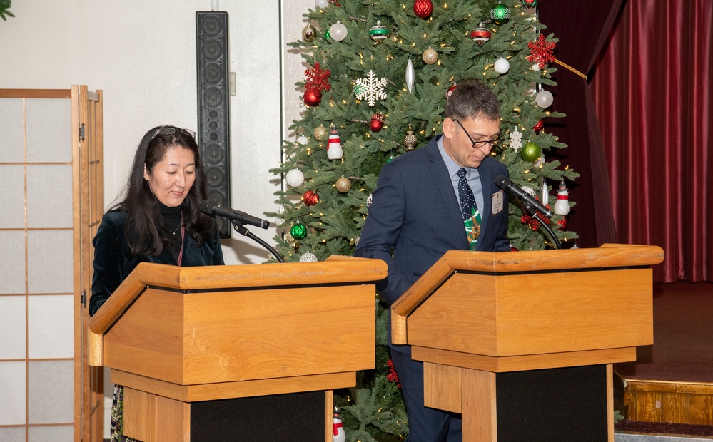 U.S., Japan strengthen bond during 374th Airlift Wing holiday social