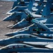 Sailors Perform Maintenance On Super Hornets