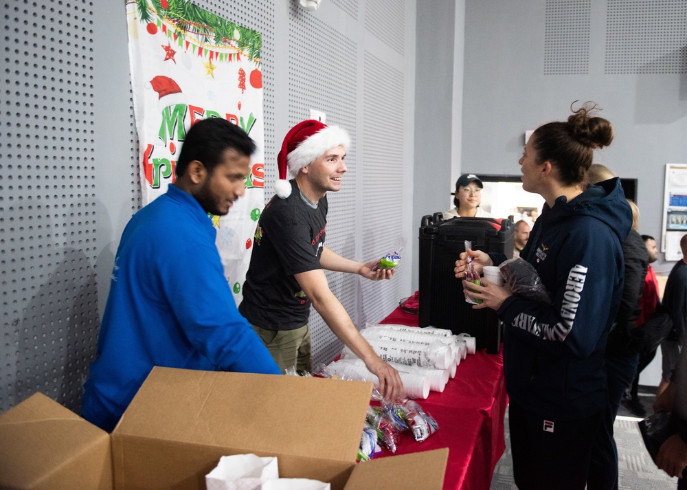 “Rock” band ushers in Holiday season for 386th AEW, coalition teammates