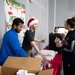 “Rock” band ushers in Holiday season for 386th AEW, coalition teammates