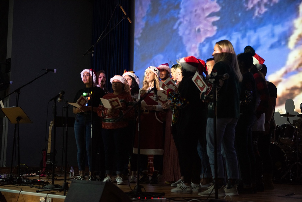 “Rock” band ushers in Holiday season for 386 AEW, coalition teammates