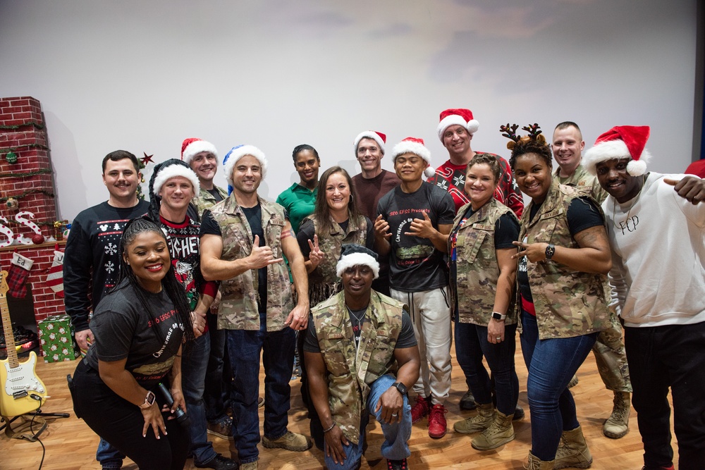 “Rock” band ushers in Holiday season for 386 AEW, coalition teammates
