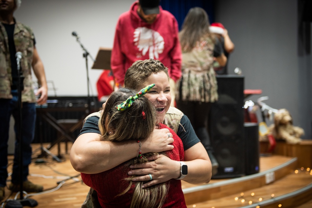 “Rock” band ushers in Holiday season for 386 AEW, coalition teammates