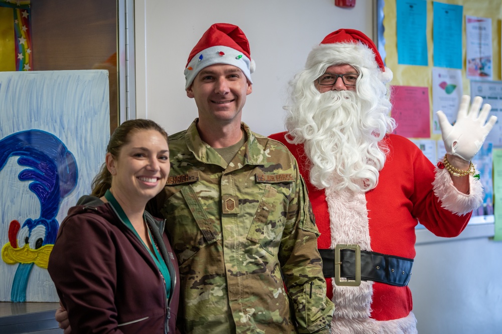 349 AMW Airmen deliver holiday cheer