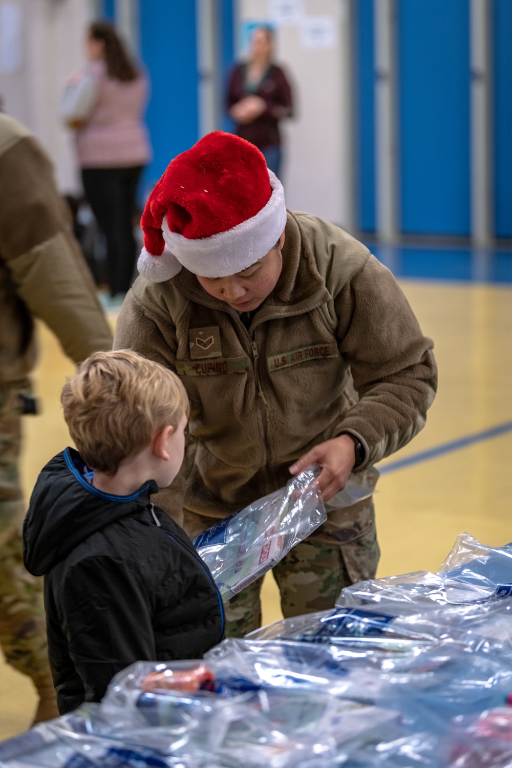 349 AMW Airmen deliver holiday cheer