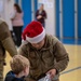 349 AMW Airmen deliver holiday cheer