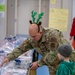 349 AMW Airmen deliver holiday cheer