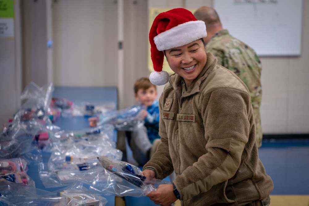 349 AMW Airmen deliver holiday cheer