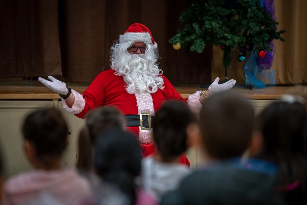 349 AMW Airmen deliver holiday cheer