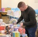 Employees and Volunteers help bring Holiday Magic to Guard families