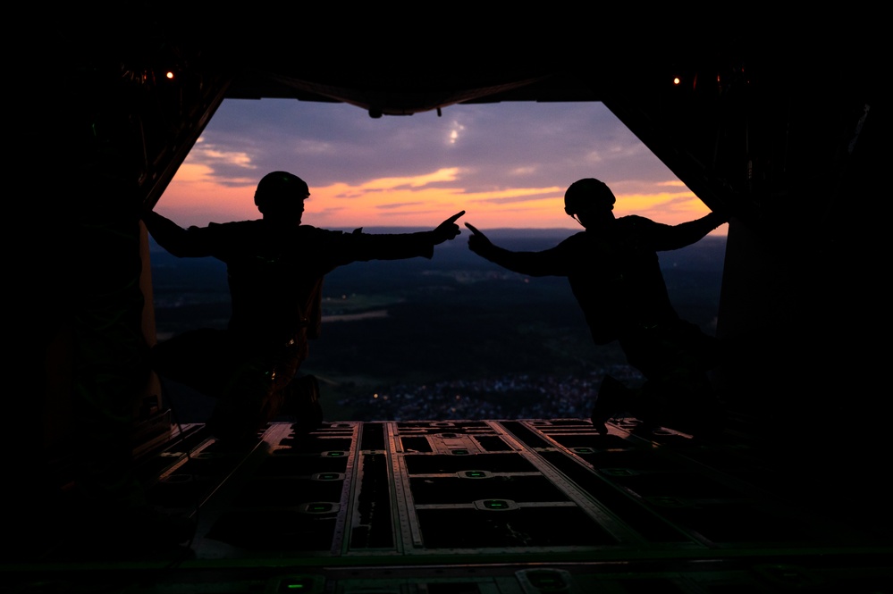 U.S. and German troops jump together
