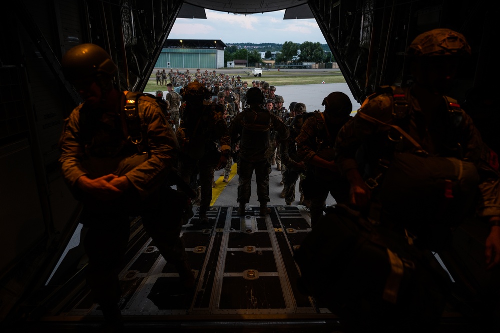 U.S. and German troops jump together