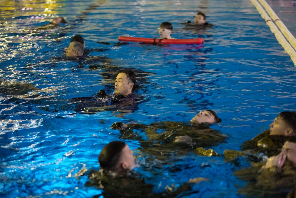 U.S. Marines, JMSDF take part in Bilateral Swim Qualification