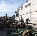 II Marine Expeditionary Force Marine Leave the USNS Trenton