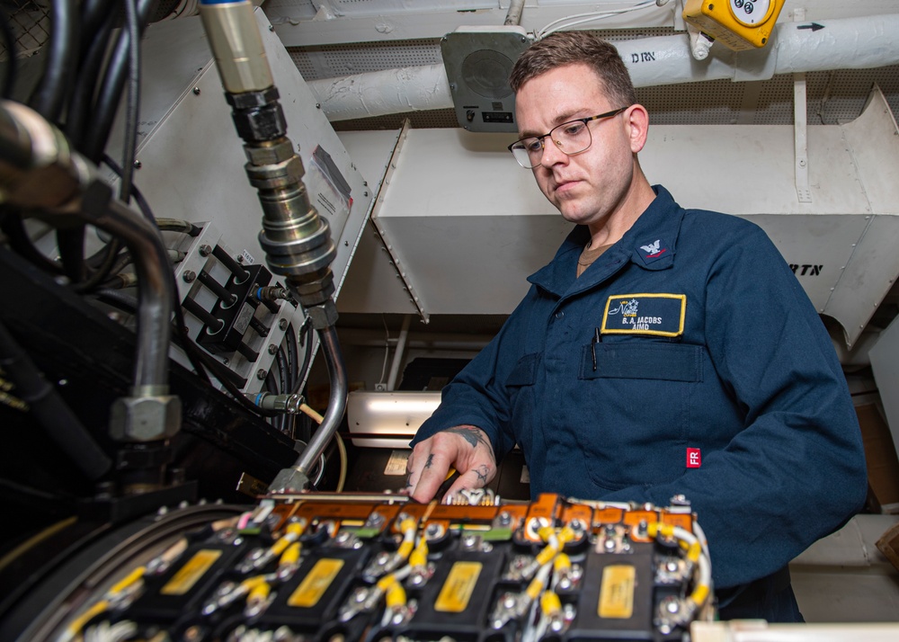 Sailor Performs Maintenance
