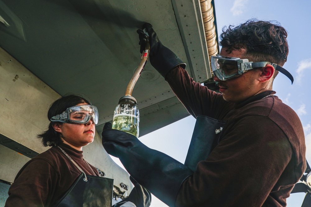 Sailors Collect Fuel Sample