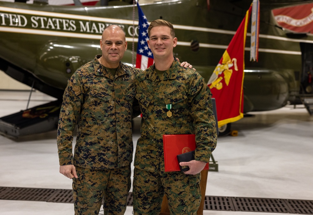 Cpl. Chase Portello receives a Navy Commendation Medal for life saving actions