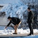 U.S. Marine Corps Sgt. Angel Paz makes a snowman