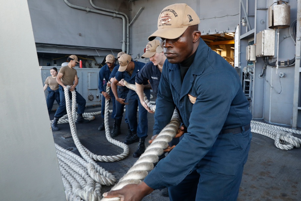 USS Abraham Lincoln pulls in to port