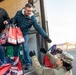 Volunteers from the 142nd Wing and USO participate in &quot;Everything but the Turkey&quot; food drive