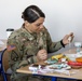 Soldiers Craft Holiday Decorations with Polish Youth