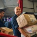 U.S. Navy Sailors Sort Mail