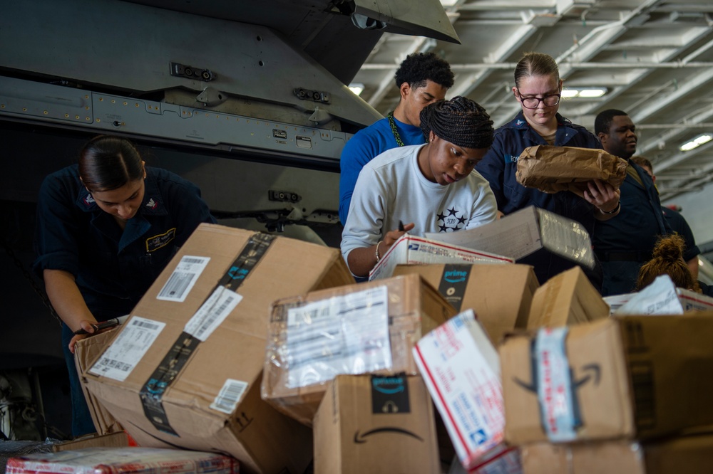 U.S. Navy Sailors Sort Mail