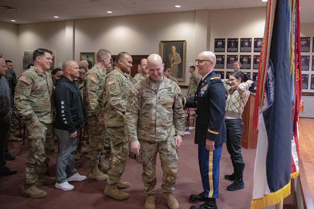 Army communication warrant officer get promoted during ceremony