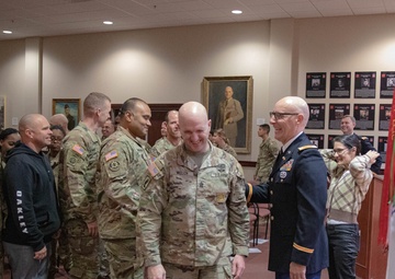 Army communication warrant officer get promoted during ceremony