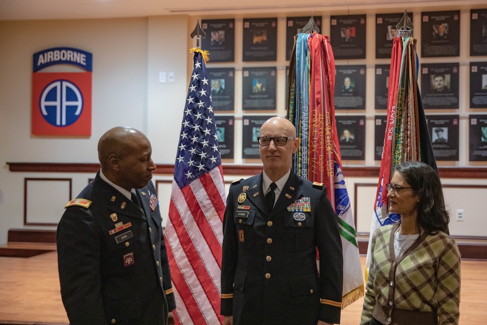 Derek Stubbs pins CW5 by Wife Mina and Col. Byrd