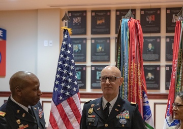 Derek Stubbs pins CW5 by Wife Mina and Col. Byrd