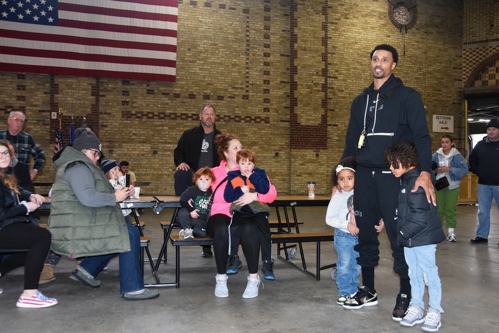 Milwaukee Buck scores winning play with families of deployed Wisconsin Guard members