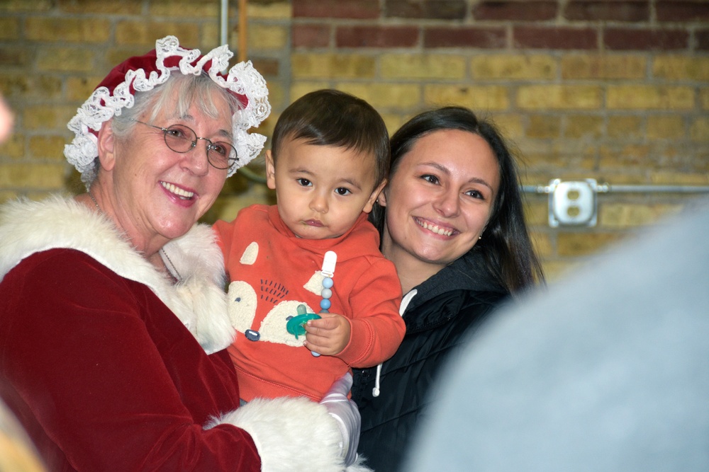 Milwaukee Buck scores winning play with families of deployed Wisconsin Guard members