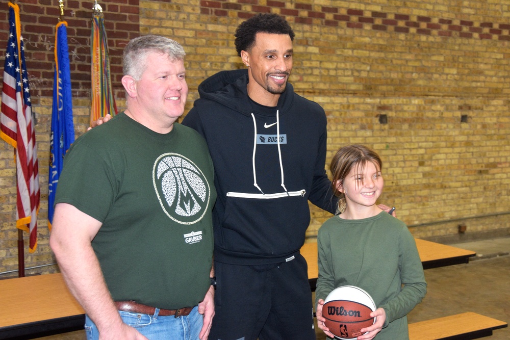 Milwaukee Buck scores winning play with families of deployed Wisconsin Guard members